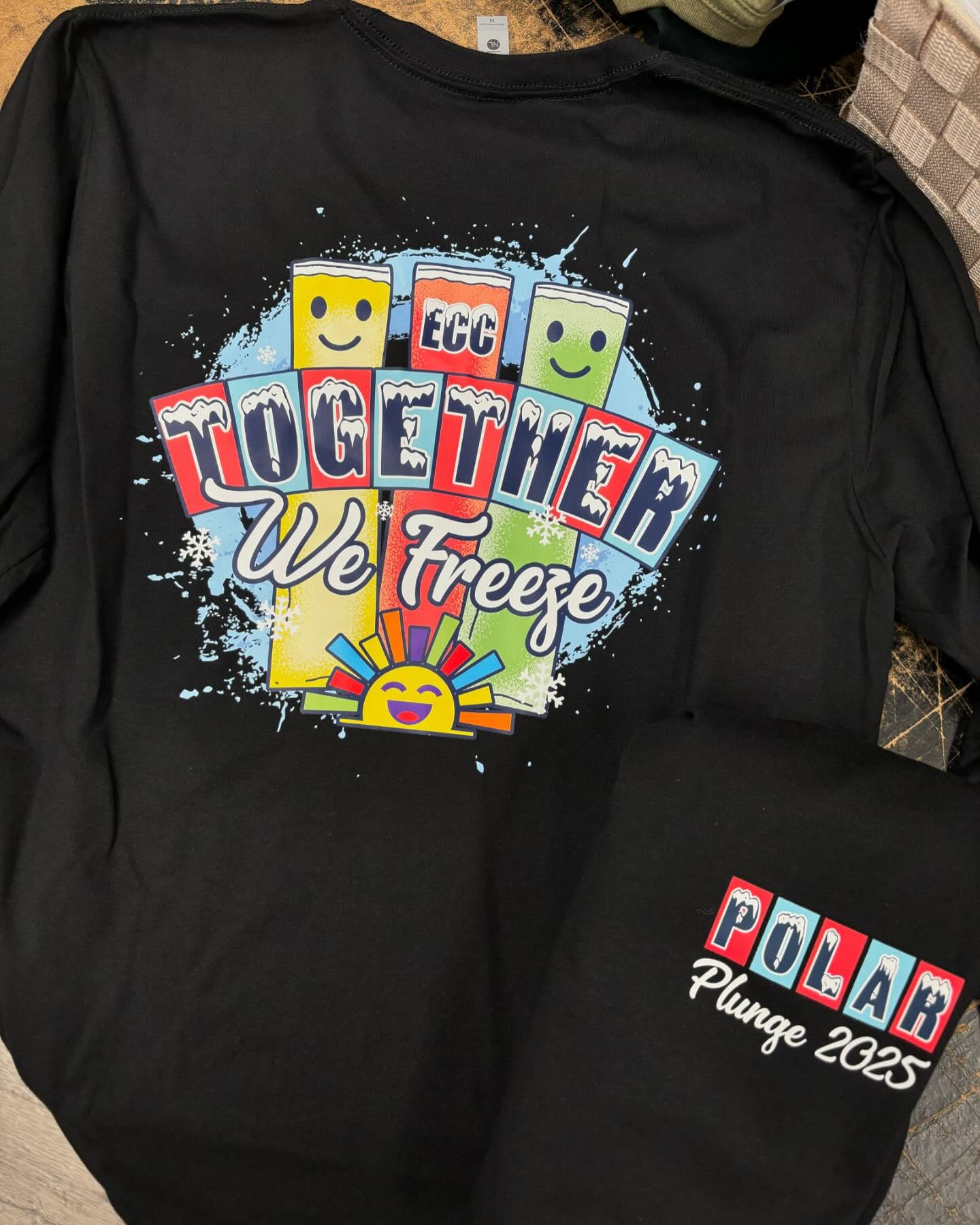 Black sweatshirt with colorful "ECC Together We Freeze" design for Polar Plunge 2025.