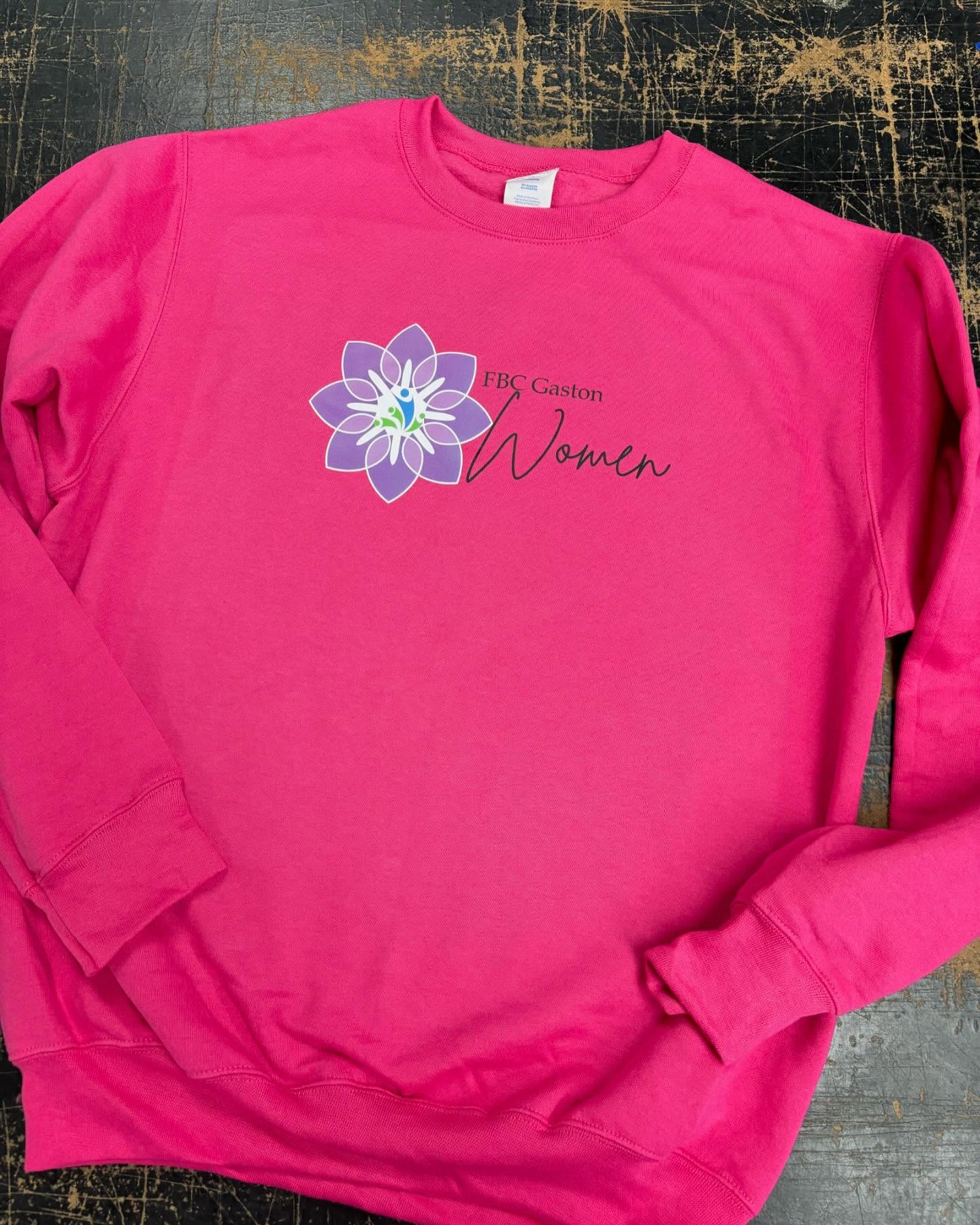 Pink crewneck sweatshirt with a floral "FBC Gaston Women" design.